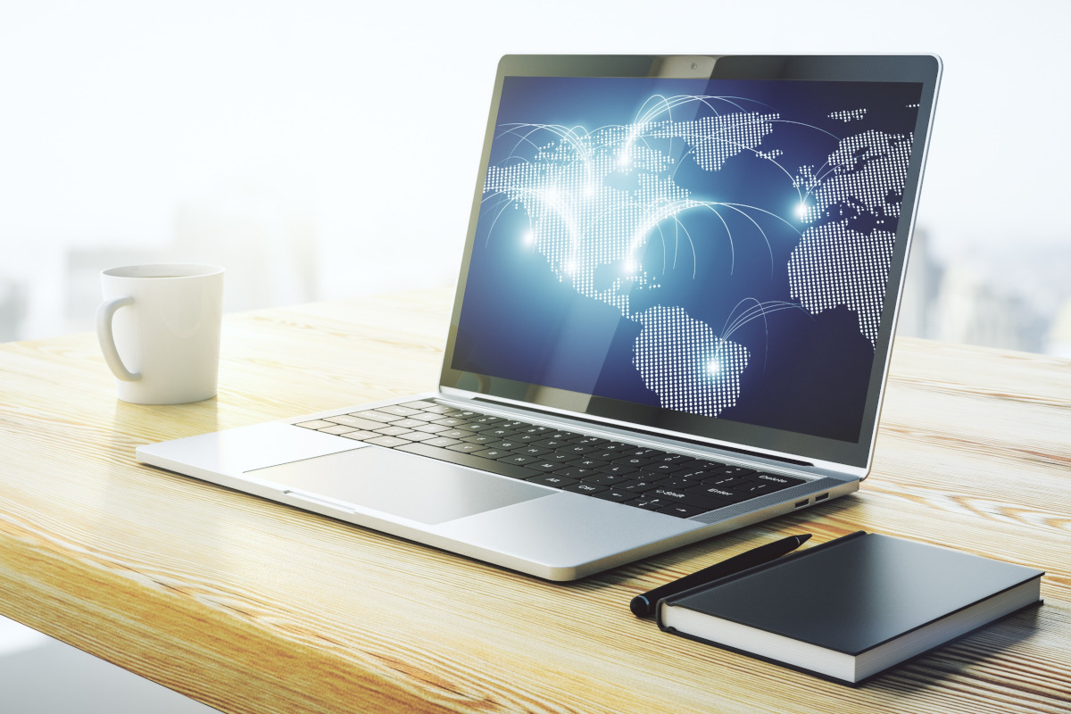 Laptop with image of world network connection